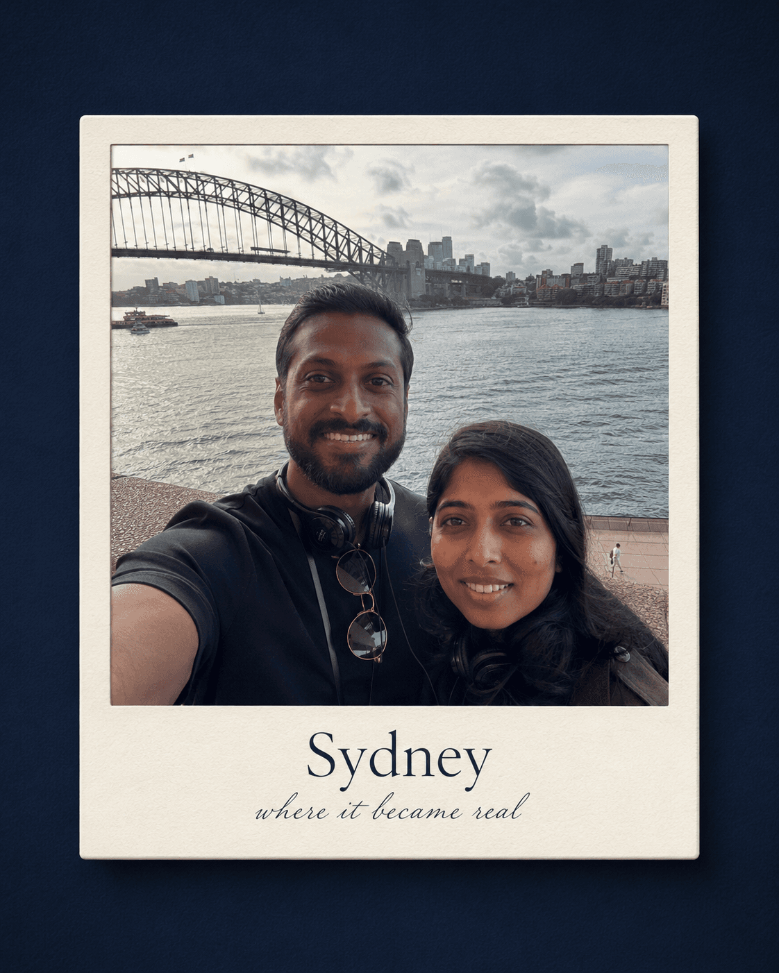 Sydney -- where it became real. Shreya and Darshit by Sydney Harbour with the Harbour Bridge behind them